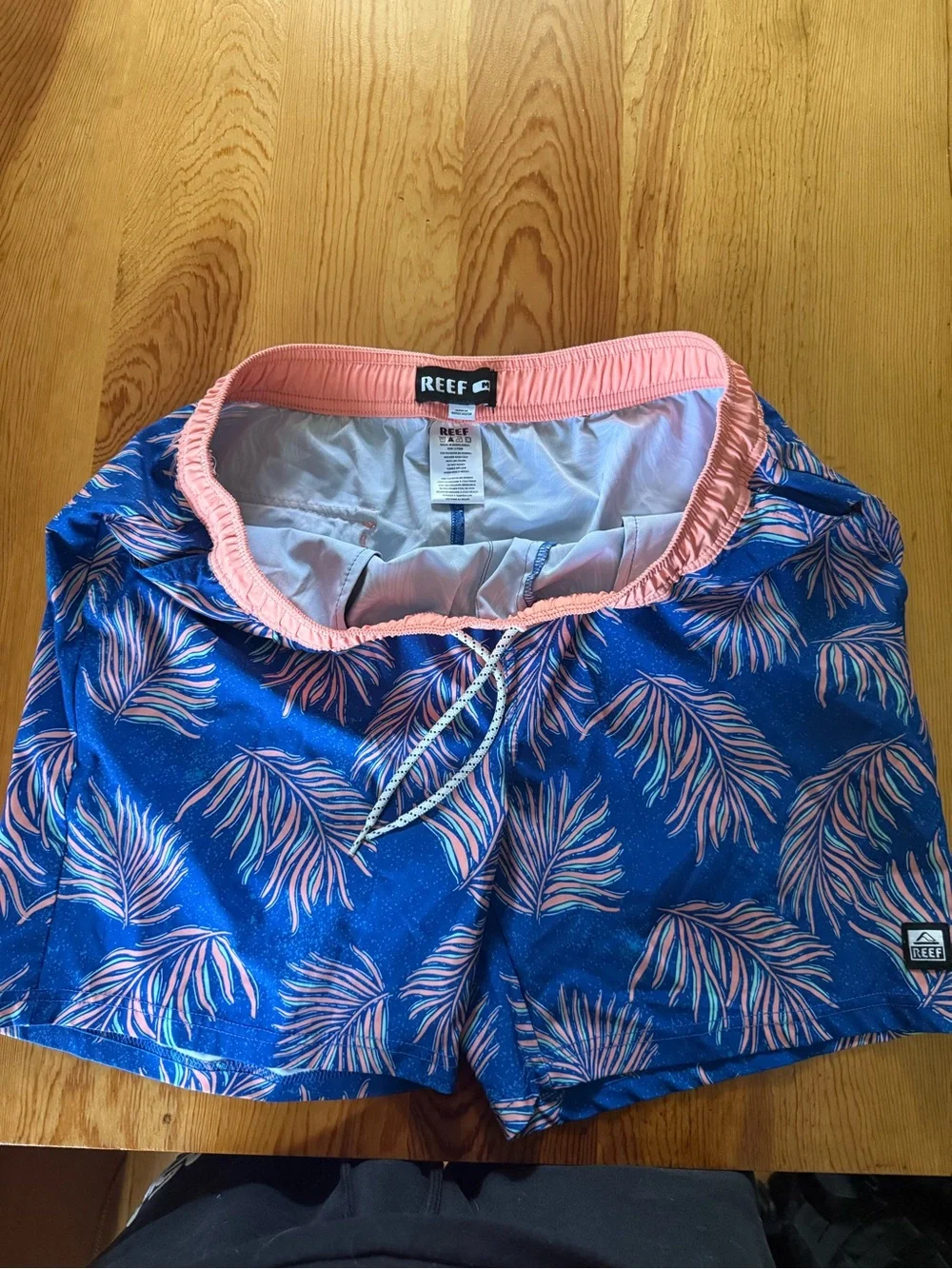 Reef Men's Blue Swim Shorts with Pink Palm Leaf Print